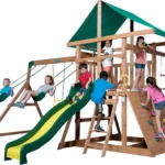 Backyard Discovery Mount Mckinley Cedar Wood Swing Set with Wave Slide, Play Deck, Double Rock Wall, Rope Ladder, Web Swing, Belt Swings, Toy Telescope, Steering Wheel, Sandbox Area, Outdoor Playset